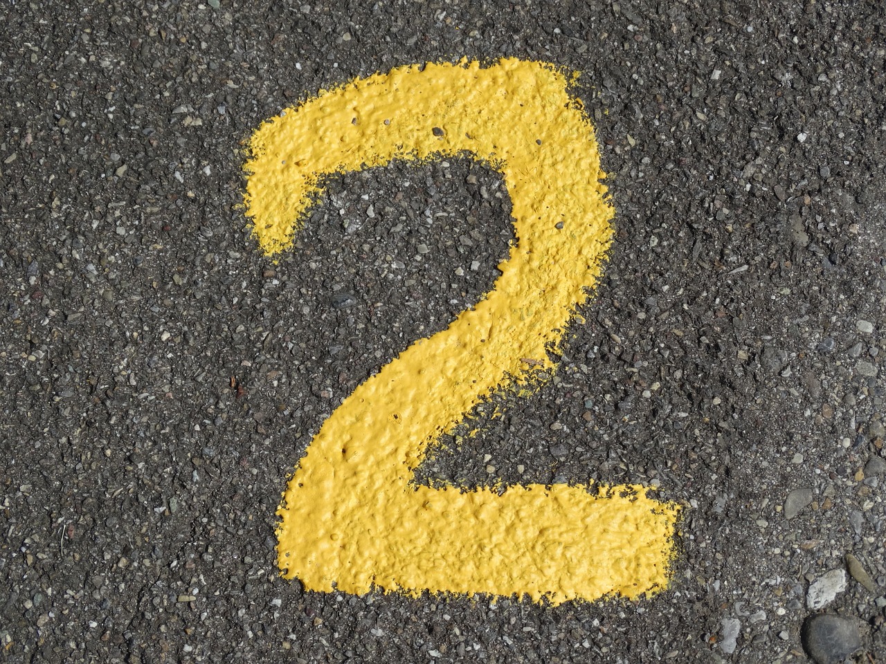 number advertisement yellow colour asphalt road digit numbering two number number number number number