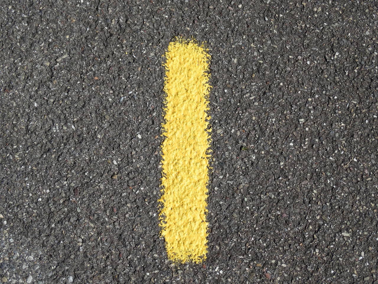 number  advertisement  yellow  colour  asphalt  road  digit  numbering  one  number  number  number  number  number  asphalt  asphalt