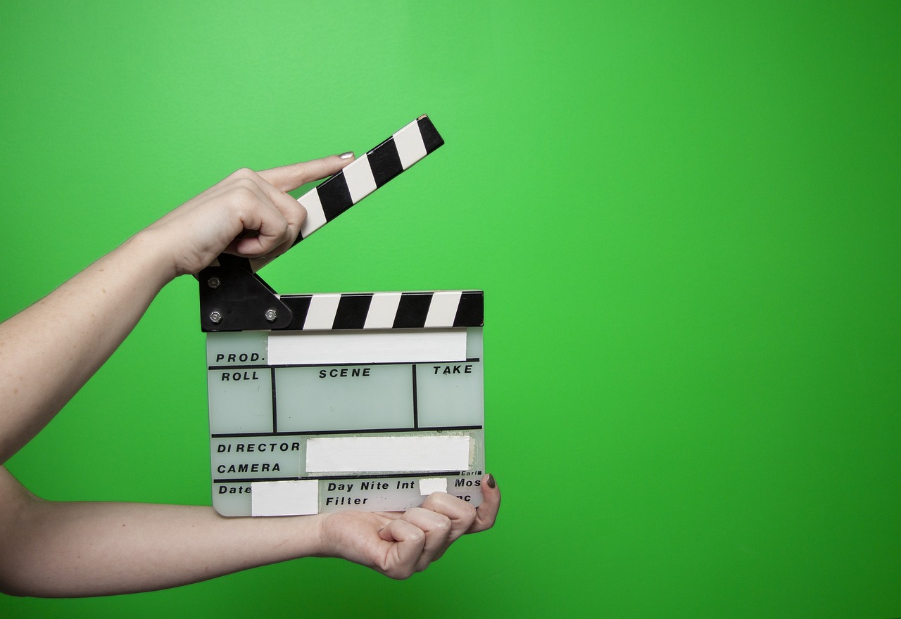 clipper movie picture video cinema film camera media woman frame b-roll holding female arm hand green screen green video green camera green videos green frame green movie green film green media green screen green screen green screen green screen green screen
